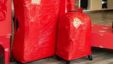 Mala envelopada com plástico pela Protec Bag